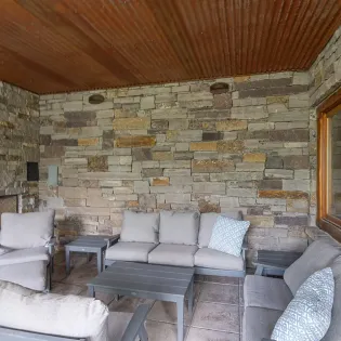 10.2 slopeside chateau telluride lower outdoor lounge fireplace