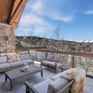 2.07 saison cinq mountain village living room deck1