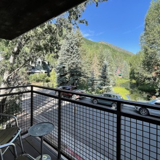 telluride downtown modern creekside deck view by living room