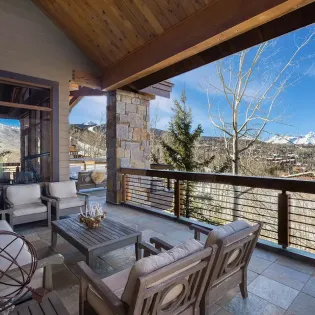 2.11 saison cinq mountain village living room deck4