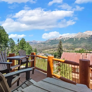 2.6 tristant 115 mountain village living room deck2