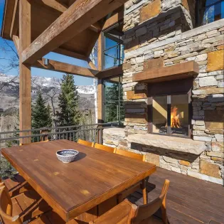 4.20 galloping goose chalet telluride outside dining fireplace