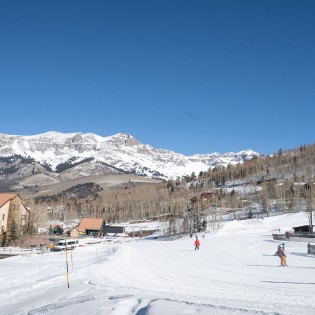 mountain village vacation rental yellow brick cabin ski slope