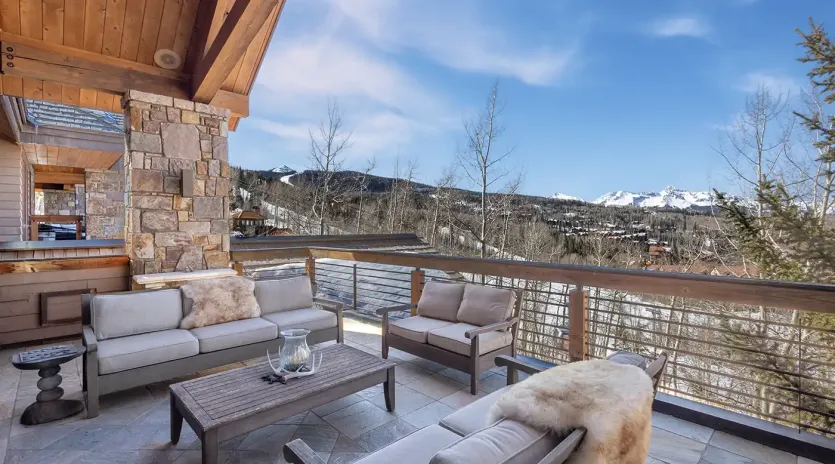 2.07 saison cinq mountain village living room deck1