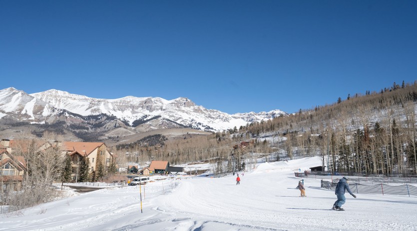 mountain village vacation rental yellow brick cabin ski slope