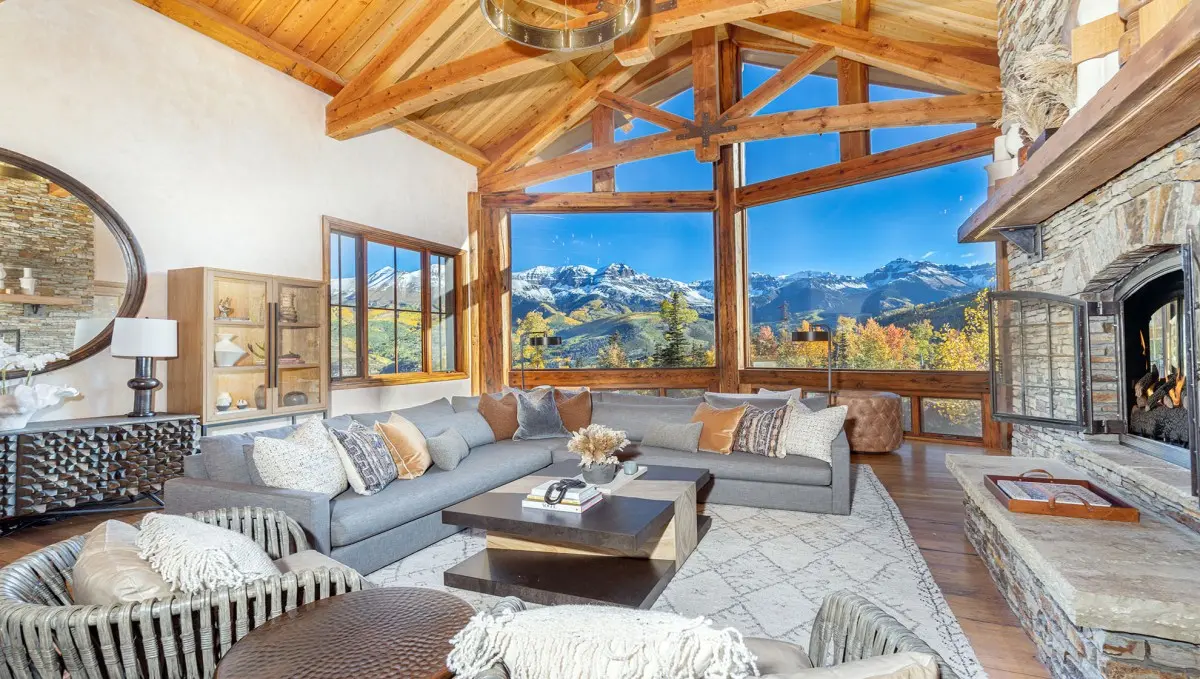Spacious Telluride vacation rental living area versus typical hotel room, emphasizing space and comfort benefits