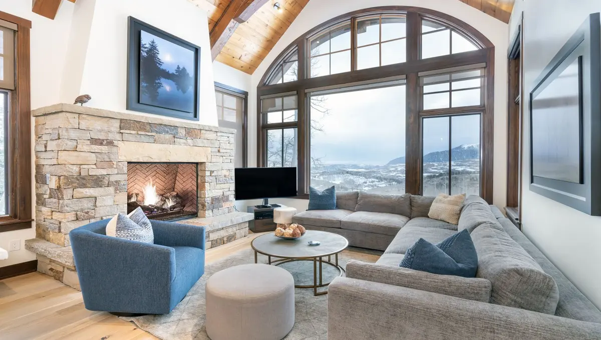 Contemporary Mountain Village vacation rental featuring modern mountain design, ski access, and panoramic alpine views.